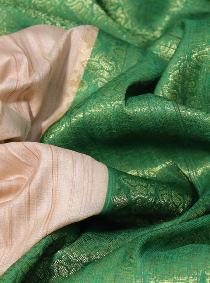 Semi tussar silk saree cream and green with plain body and long temple design ganga jamuna border