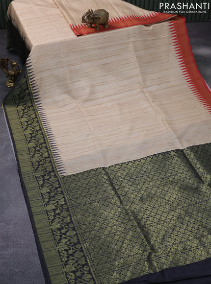 Semi tussar silk saree cream and black with plain body and long temple design ganga jamuna border