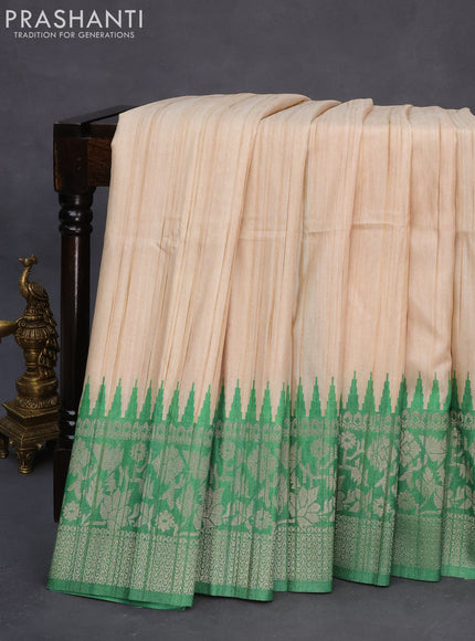 Semi tussar silk saree cream and green with plain body and long temple design ganga jamuna border