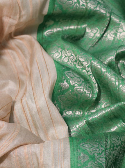 Semi tussar silk saree cream and green with plain body and long temple design ganga jamuna border