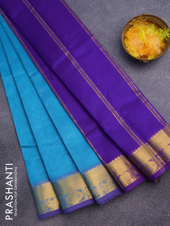 Silk cotton saree light blue and violet with plain body and annam zari woven border