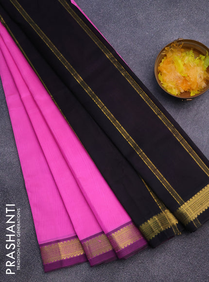 Silk cotton saree candy pink and black with plain body and zari woven border