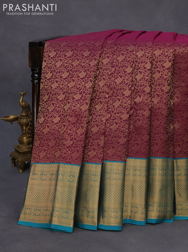 Roopam silk saree dark purple and teal green with allover zari weaves and rich zari woven border