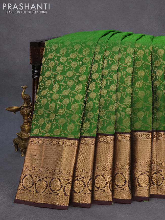 Roopam silk saree green and dark coffee brown with allover zari weaves and rich zari woven border