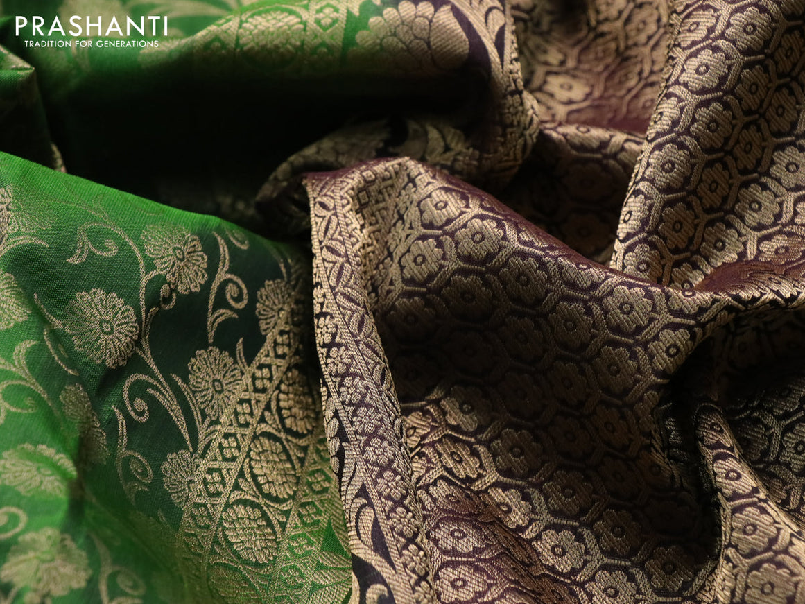 Roopam silk saree green and dark coffee brown with allover zari weaves and rich zari woven border