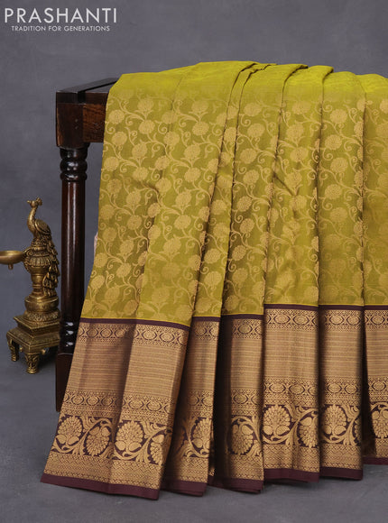 Roopam silk saree mehendi green and deep wine shade with allover zari weaves and rich zari woven border