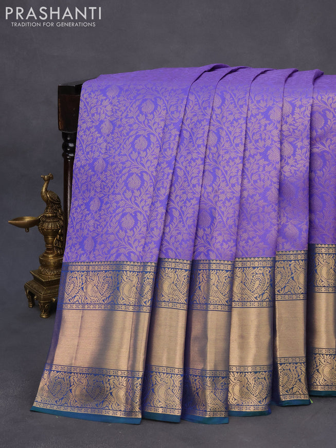 Roopam silk saree royal blue and dual shade of bluish green with allover zari woven brocade weaves and annam zari woven border