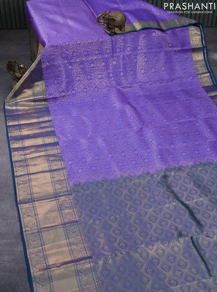 Roopam silk saree royal blue and dual shade of bluish green with allover zari woven brocade weaves and annam zari woven border