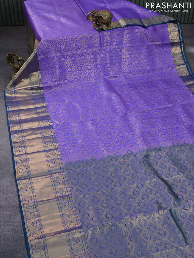 Roopam silk saree royal blue and dual shade of bluish green with allover zari woven brocade weaves and annam zari woven border