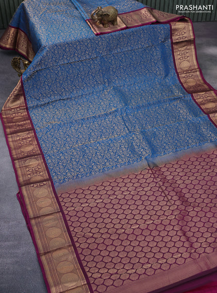 Roopam silk saree peacock blue and dark magenta pink with allover zari woven brocade weaves and zari woven border