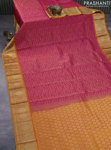 Roopam silk saree pink and mustard shade with allover zari woven brocade weaves and zari woven border