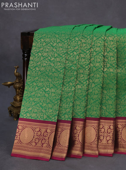 Roopam silk saree green and dark magenta pink with allover zari weaves and rich zari woven border