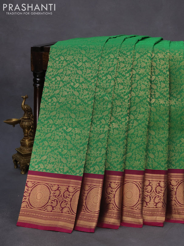 Roopam silk saree green and dark magenta pink with allover zari weaves and rich zari woven border