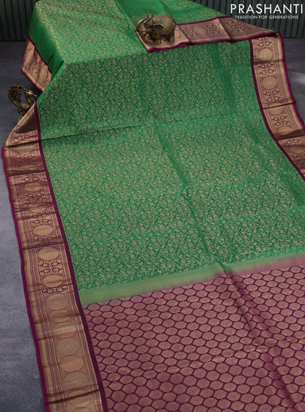 Roopam silk saree green and dark magenta pink with allover zari weaves and rich zari woven border