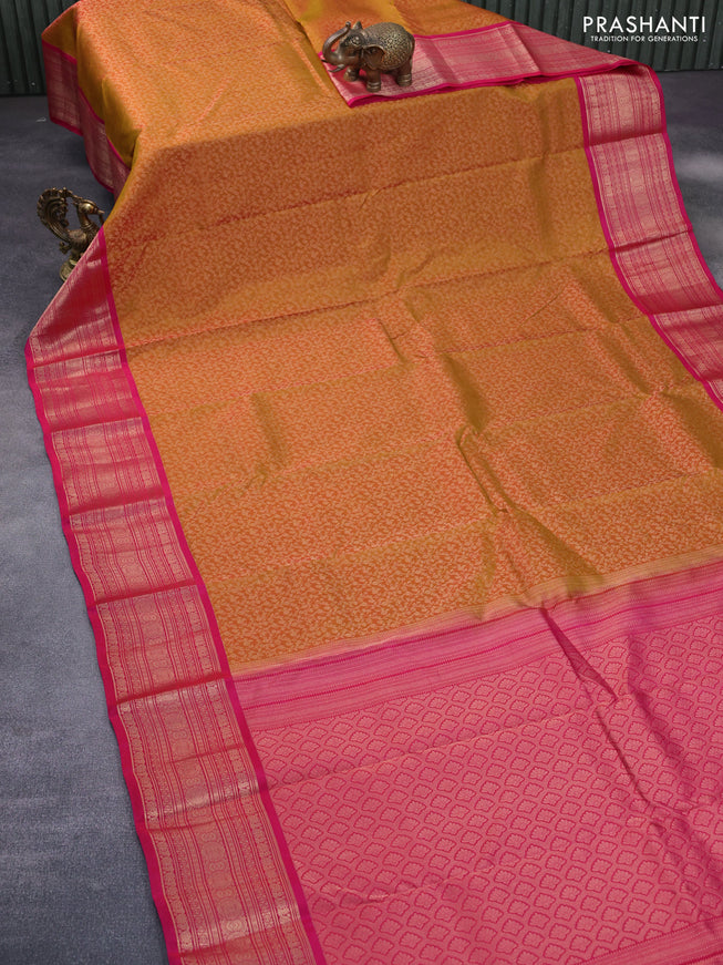 Roopam silk saree dual shade of mustard yellow and pink with allover zari weaves and rich zari woven border