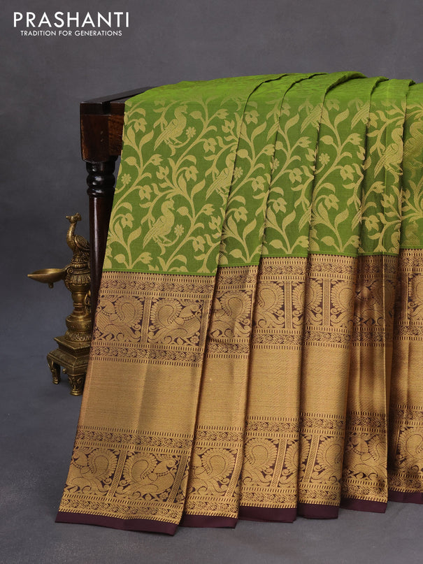 Roopam silk saree mehendi green and wine shade with allover zari weaves and long annam zari woven border