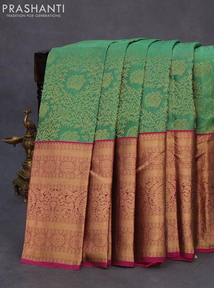 Roopam silk saree green shade and magenta pink with allover zari woven brocade weaves and long rich zari woven border