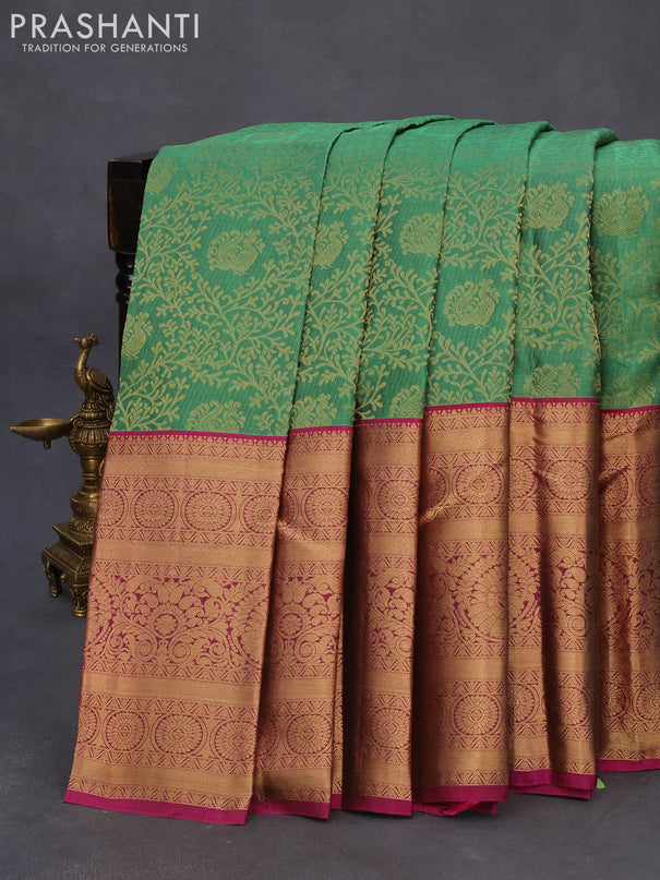 Roopam silk saree green shade and magenta pink with allover zari woven brocade weaves and long rich zari woven border