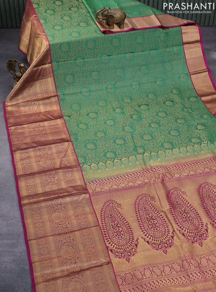 Roopam silk saree green shade and magenta pink with allover zari woven brocade weaves and long rich zari woven border