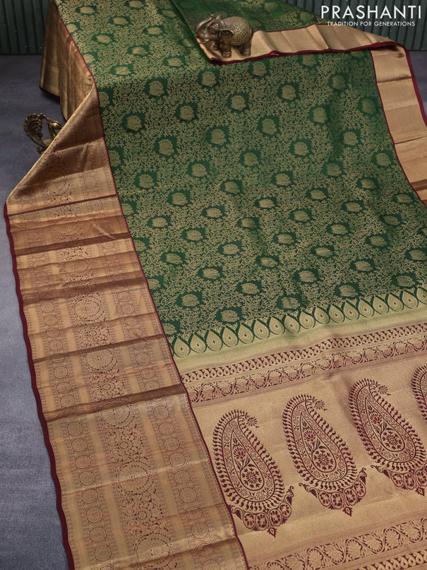 Roopam silk saree green and maroon with allover zari weaves and long rich zari woven border