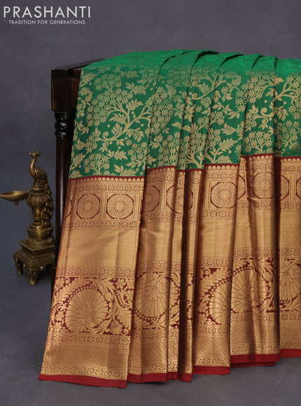 Roopam silk saree green and maroon with allover zari weaves and long rich zari woven border