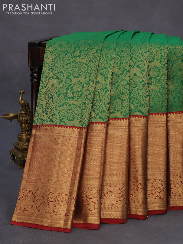 Roopam silk saree green and maroon with allover zari woven brocade weaves and long rich zari woven border