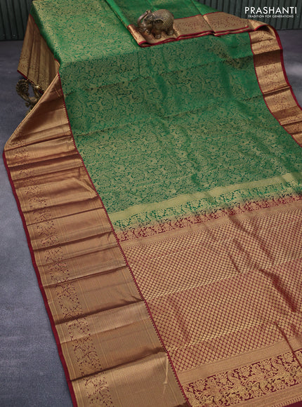 Roopam silk saree green and maroon with allover zari woven brocade weaves and long rich zari woven border