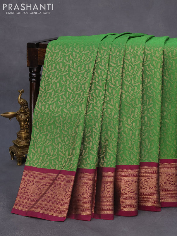 Roopam silk saree green and dark magenta pink with allover zari weaves and rich zari woven border