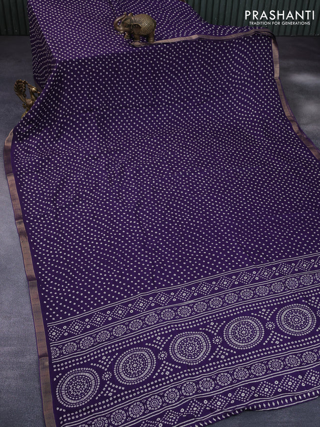 Semi georgette saree deep violet with allover bandhani prints and zari woven border