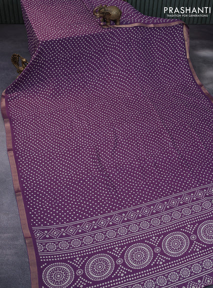 Semi georgette saree lavender shade with allover bandhani prints and zari woven border