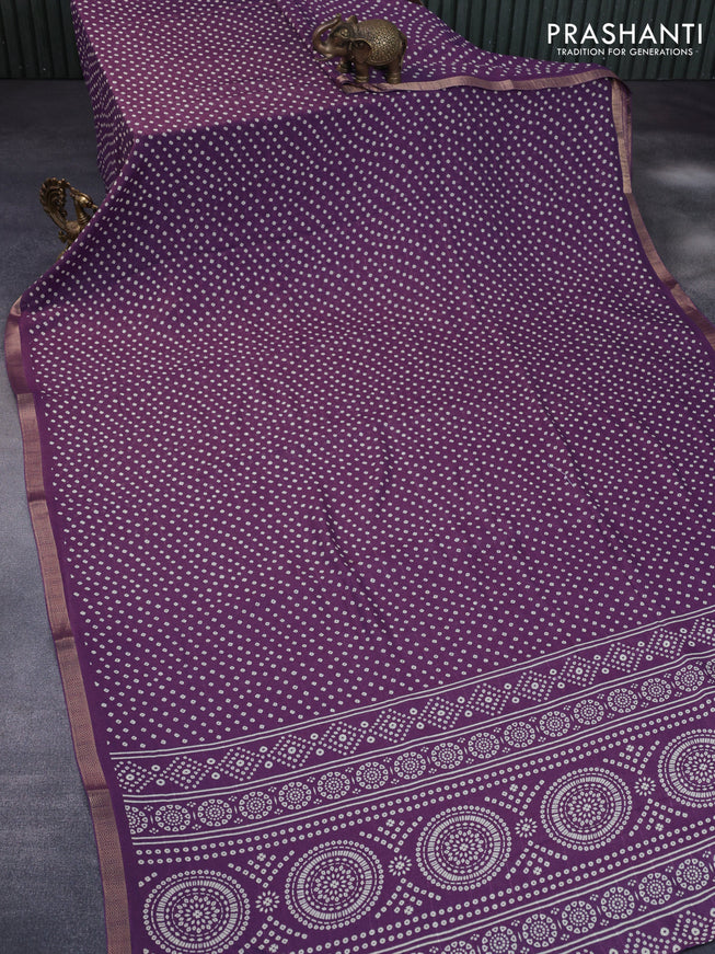 Semi georgette saree lavender shade with allover bandhani prints and zari woven border