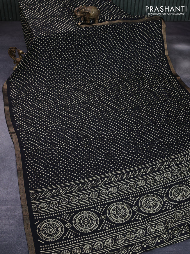 Semi georgette saree black with allover bandhani prints and zari woven border