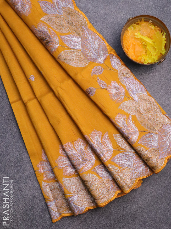 Semi raw silk saree mustard yellow with embroidery work buttas and floral design embroidery work border