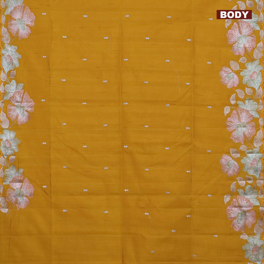 Semi raw silk saree mustard yellow with embroidery work buttas and floral design embroidery work border