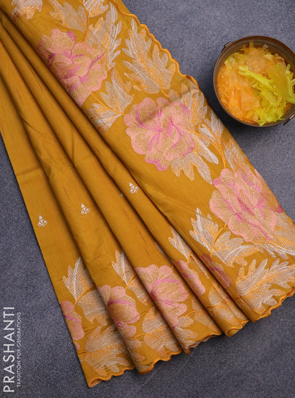 Semi raw silk saree mustard yellow with embroidery work buttas and floral design embroidery work border