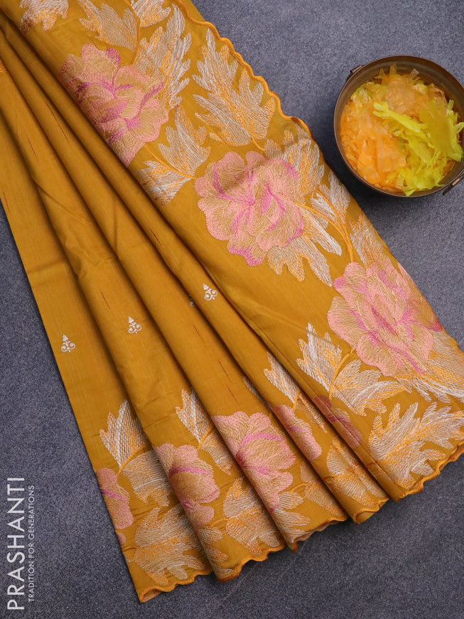 Semi raw silk saree mustard yellow with embroidery work buttas and floral design embroidery work border