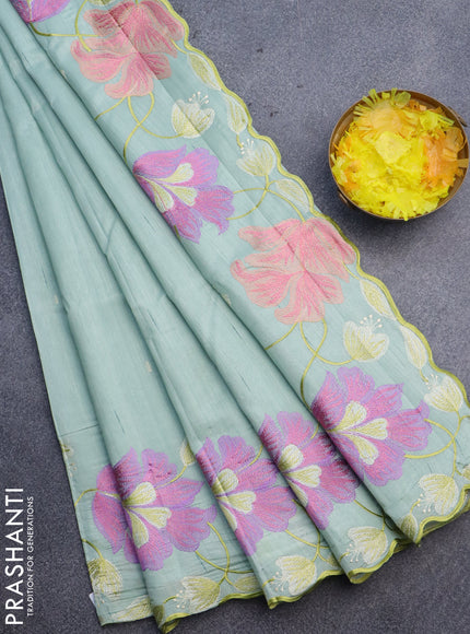 Semi raw silk saree pastel green with embroidery work buttas and floral design embroidery work border