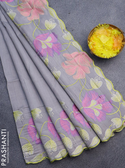 Semi raw silk saree grey with embroidery work buttas and floral design embroidery work border