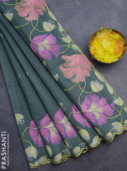 Semi raw silk saree green shade with embroidery work buttas and floral design embroidery work border