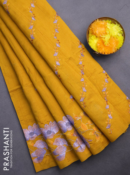 Semi raw silk saree mustard yellow with embroidery work buttas and floral embroidery work border