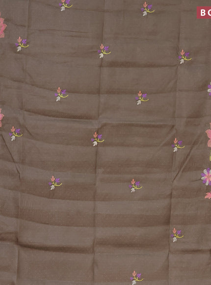 Semi raw silk saree grey shade with embroidery work buttas and floral embroidery work border