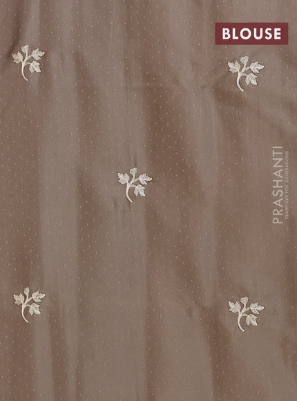 Semi raw silk saree grey shade with embroidery work buttas and floral embroidery work border