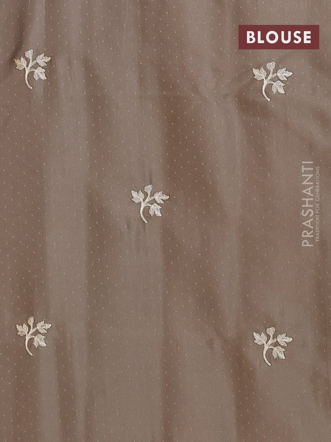 Semi raw silk saree grey shade with embroidery work buttas and floral embroidery work border