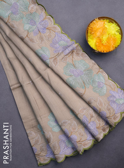 Semi raw silk saree beige with embroidery work buttas and floral embroidery work border