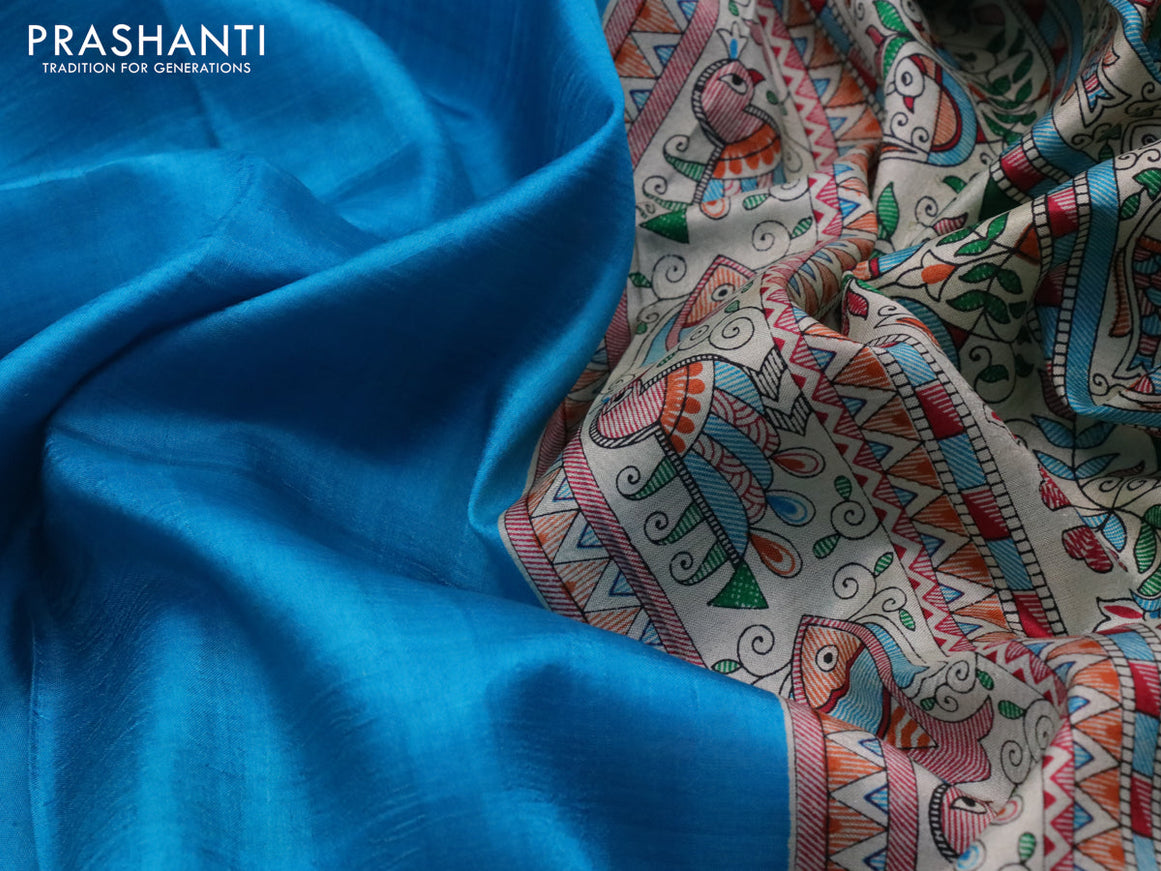 Madhubani printed silk saree cs blue and cream with plain body and madhubani printed border