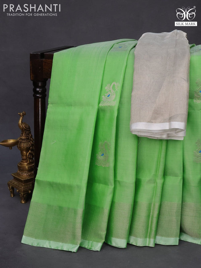 Pure uppada silk saree green with silver zari woven buttas and silver zari woven border