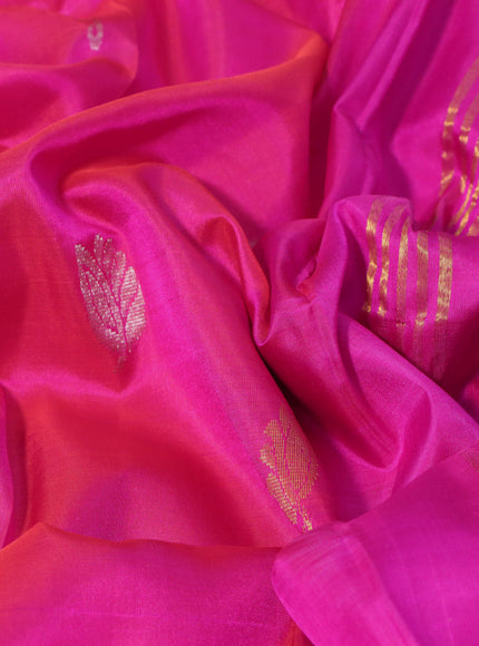 Pure uppada silk saree dual shade of pinkish orange and pink with silver & gold zari woven buttas and zari woven simple border