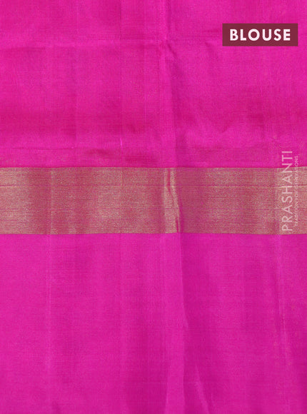 Pure uppada silk saree dual shade of pinkish orange and pink with silver & gold zari woven buttas and zari woven simple border