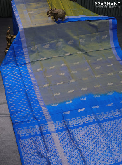 Pure uppada silk saree dual shade of yellowish blue and cs blue with zari woven buttas and long silver zari woven butta border