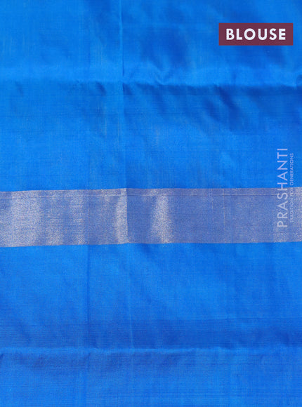 Pure uppada silk saree dual shade of yellowish blue and cs blue with zari woven buttas and long silver zari woven butta border